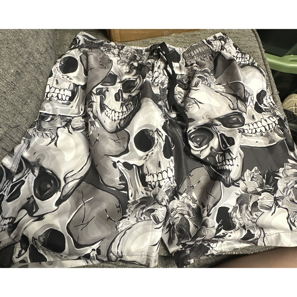 Black and white skull swim trunks